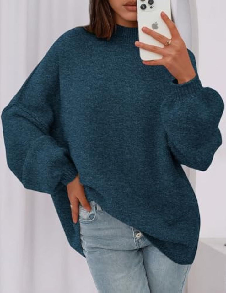 Ladies oversized knitted pullover with stand-up collar and balloon sleeves Drune