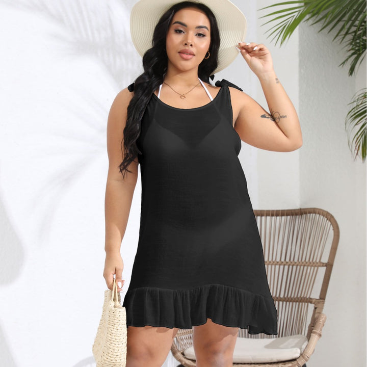 Women's casual beach dress with ruffled hem and strap detail Mune Fashion