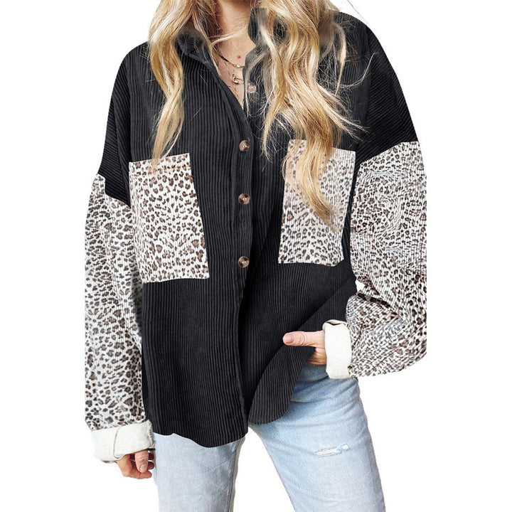 Women's oversized shirt blouse with textured fabric, contrast sleeves in leopard print and patch pockets Mune Fashion