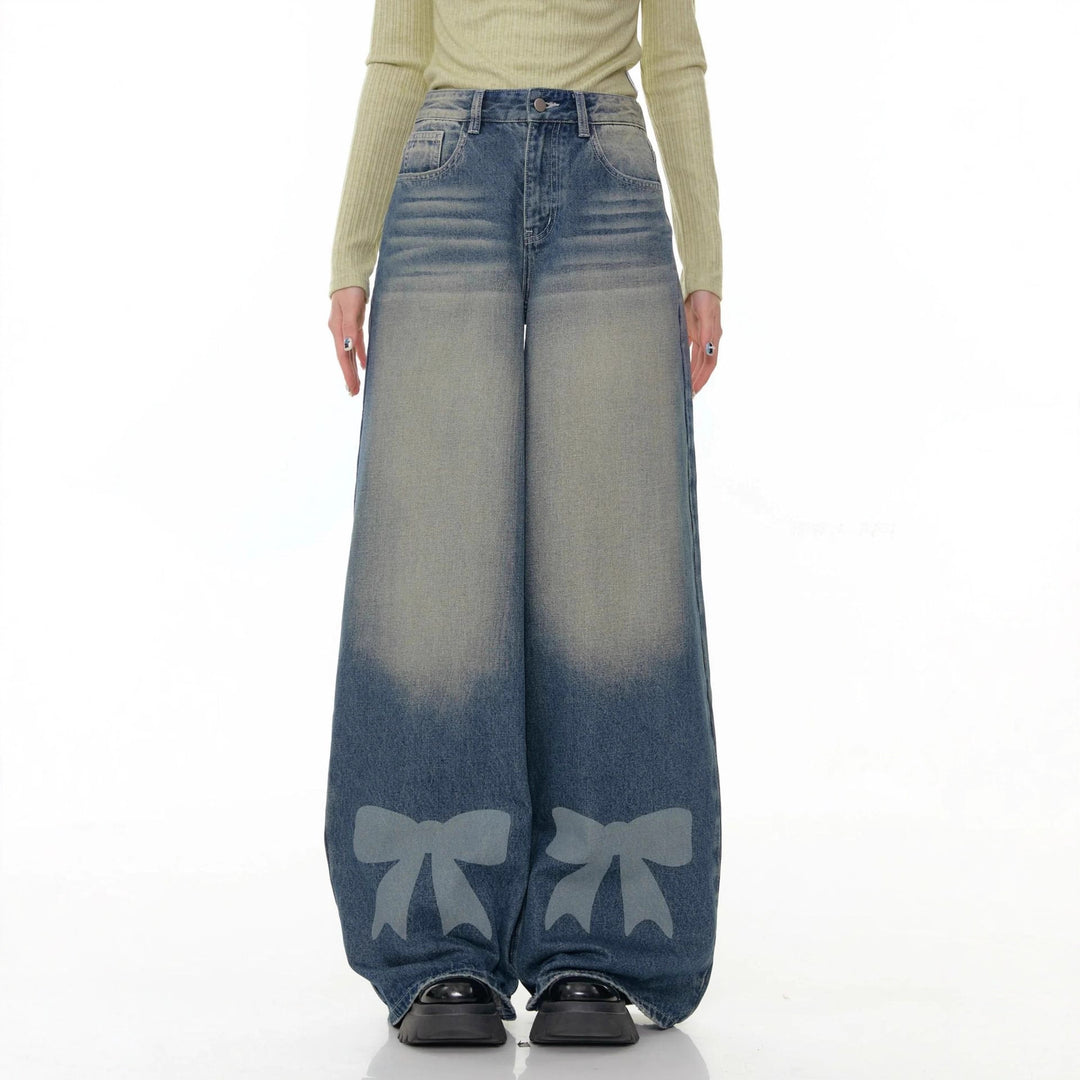 Women's high-waisted Palazzo pants made of denim with extra wide leg and bow print Mune Fashion