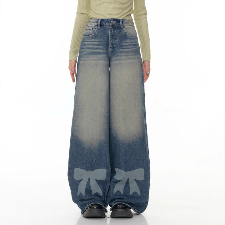 Women's high-waisted Palazzo pants made of denim with extra wide leg and bow print Mune Fashion