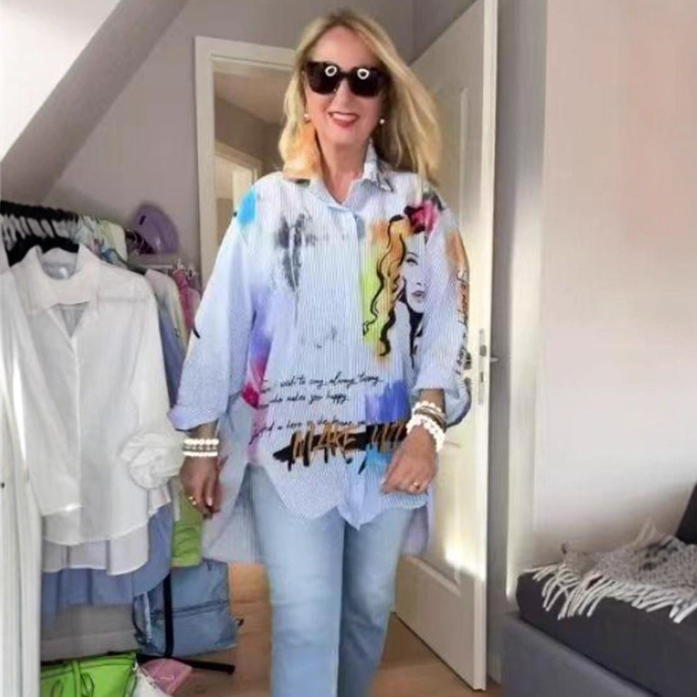 Ladies loose-fitting shirt blouse with artistic graffiti print, fine pinstripe texture and extended hem Mune Fashion