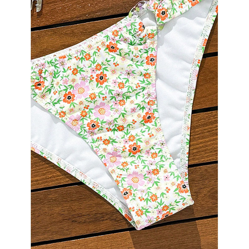 Women's bikini set with floral print and sophisticated ruffles