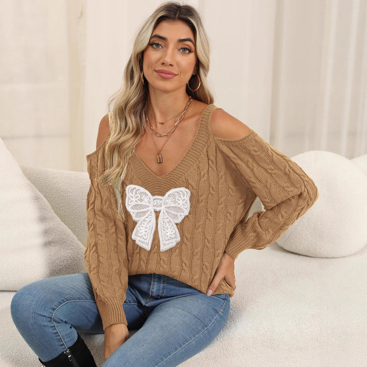 Women's stylish sweater with playfully knitted bow motif Mune Fashion