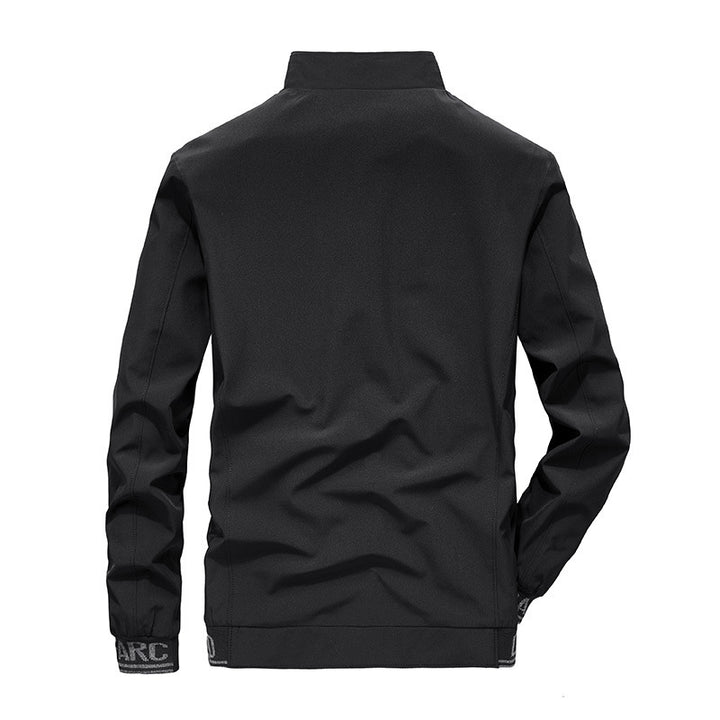 Men's softshell jacket with reflective inserts, water-repellent zip pockets, and high stand-up collar Mune Fashion