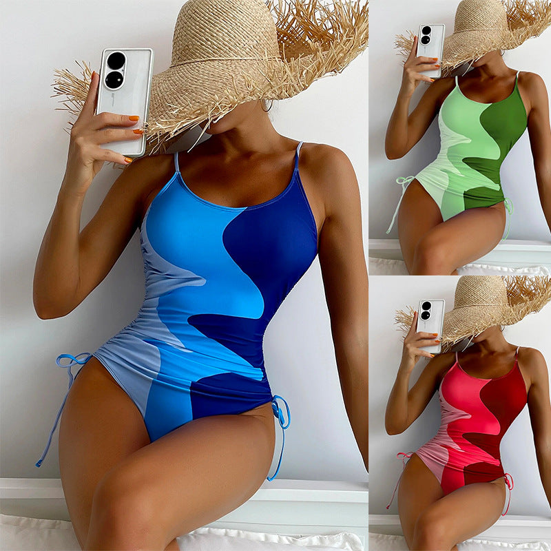 Women's one-piece swimsuit with playful cut-outs and floral design Mune Fashion