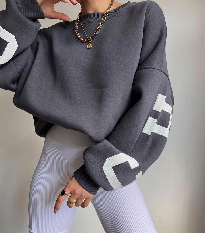Women's Oversized Sweatshirt with Block Print Sleeves and Wide Drop Shoulder Cut Mune Fashion