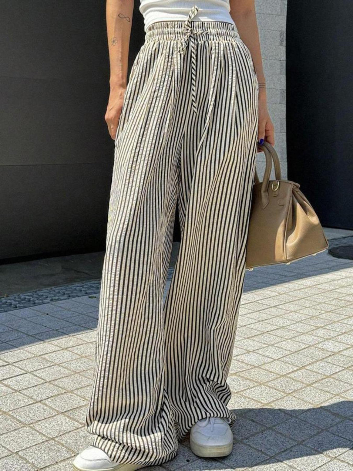 Women's Marlene striped pants made of linen blend with wide leg, elastic waistband and drawstring Mune Fashion