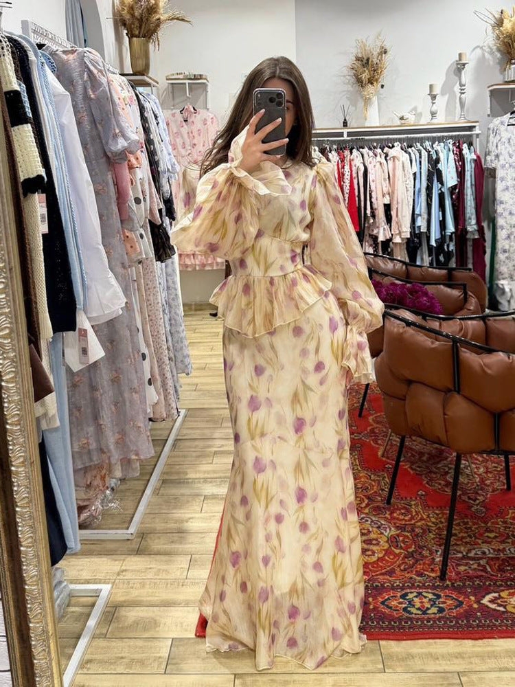 Women's dress made of transparent chiffon with fitted bodice, ruffled peplum and voluminous bell sleeves Mune Fashion