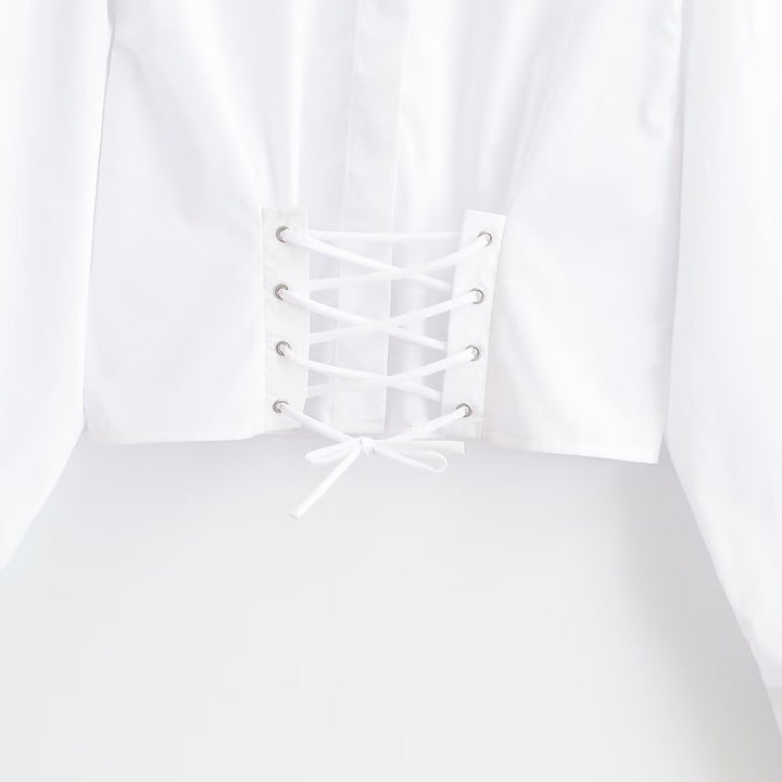Women's short blouse with stand-up collar, cord corsage at the hem and voluminous sleeves Mune Fashion