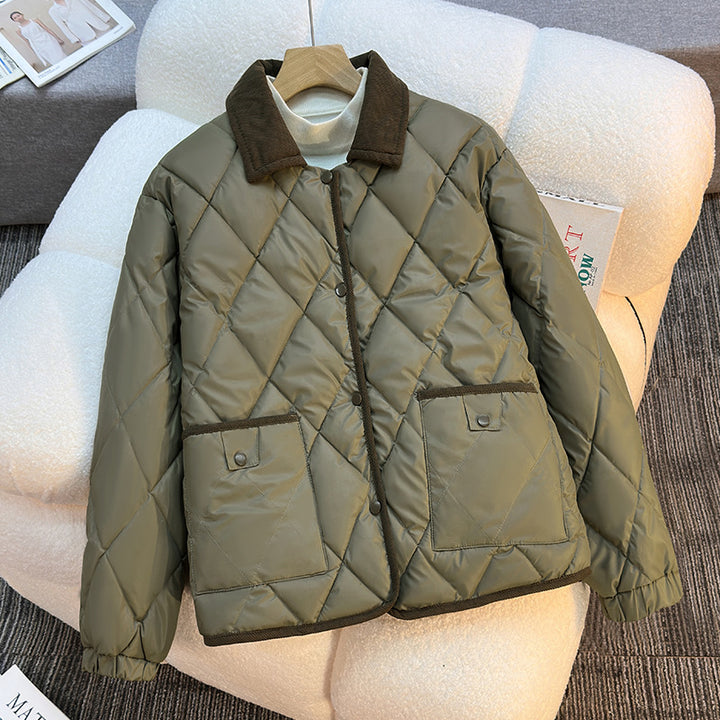 Women’s short quilted jacket with diamond stitching, cord collar, and flap pockets Mune Fashion