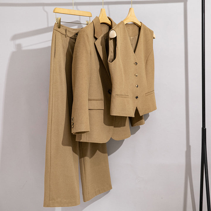 Women Long Cut Wool Blend Blazer with Single Button Closure and Flap Pockets Mune Fashion