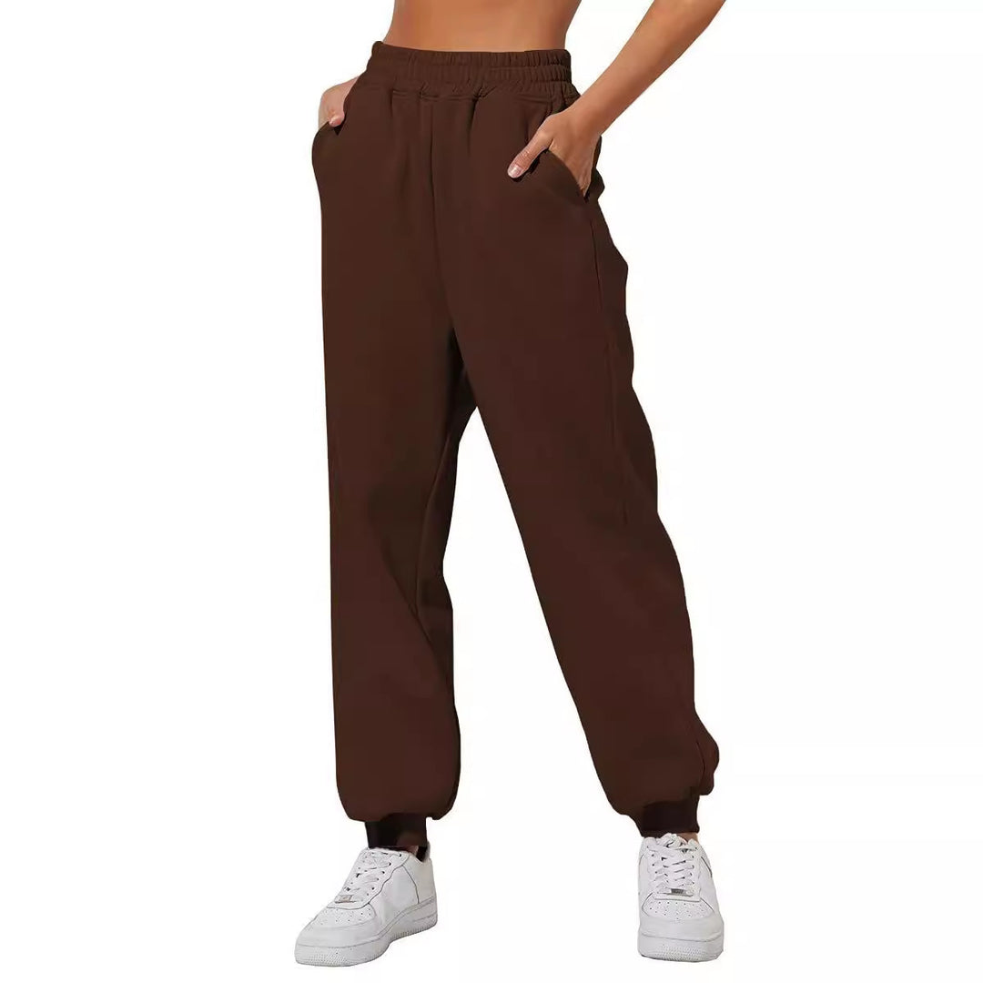 Women's relaxed high-waist jogging pants with double-layer comfort waistband, side pockets, and gathered ankle cuffs Mune Fashion