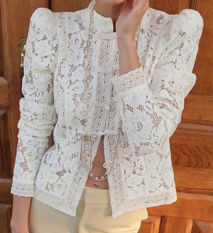 Women's figure-hugging lace blouse with stand collar, decorative knot closure, and crocheted hem Mune Fashion