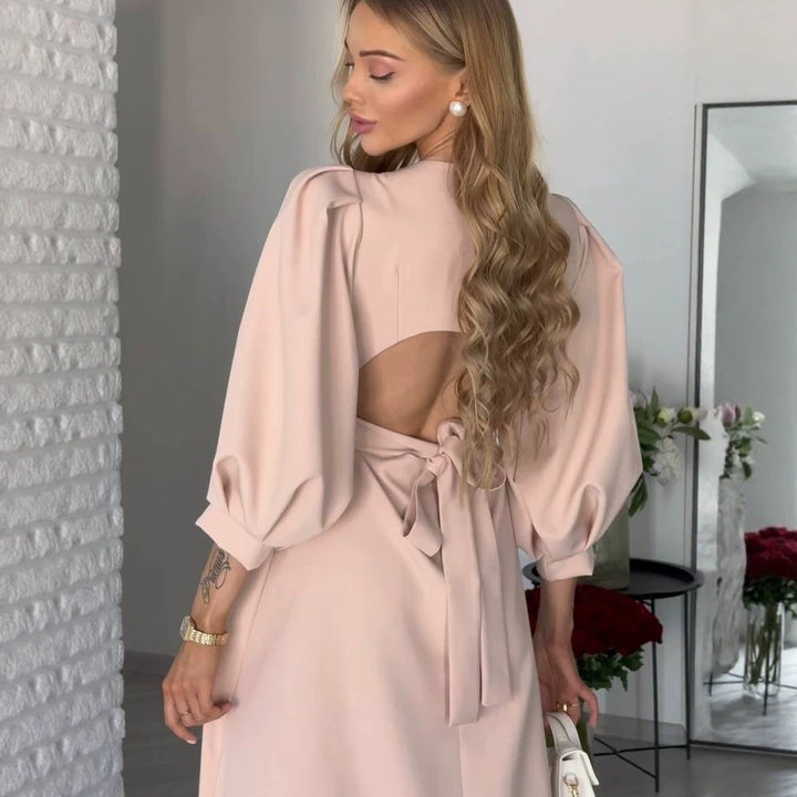 Women's midi dress with open back cutout, voluminous puff sleeves and tie belt Mune Fashion