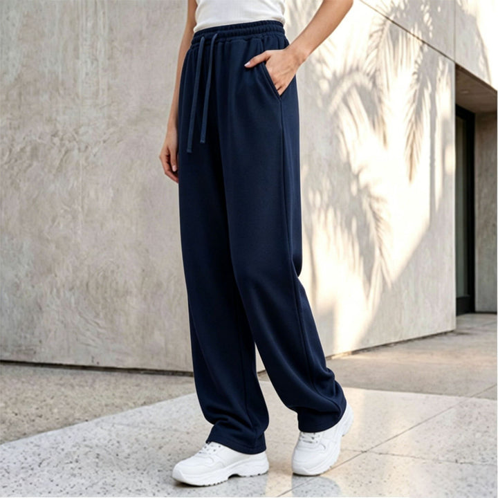Women's wide lounge palazzo pants with high comfort waistband, drawstring, side pockets, and decorative side seam Mune Fashion