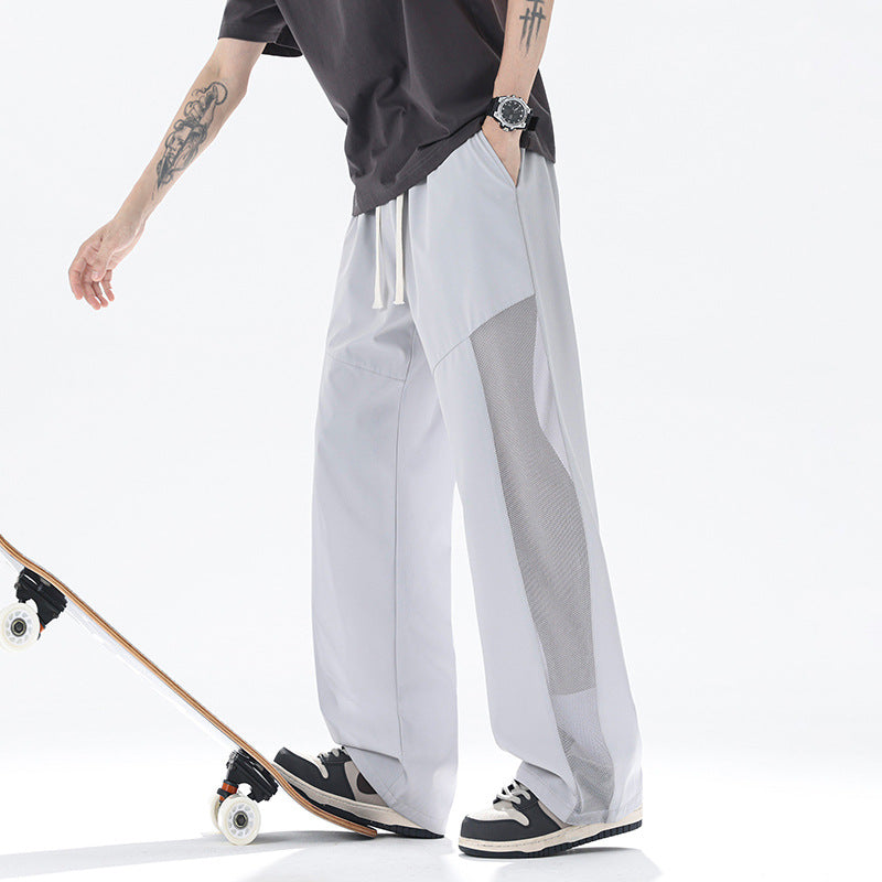 Men's slack pants with breathable mesh inserts