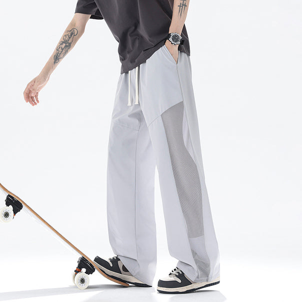 Men's slack pants with breathable mesh inserts