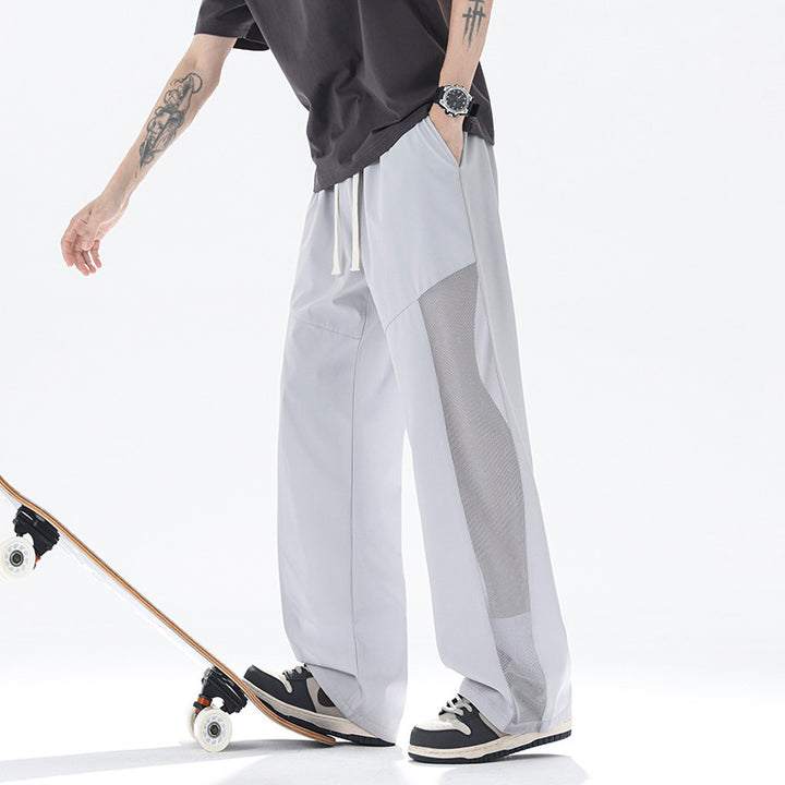Men's slack pants with breathable mesh inserts
