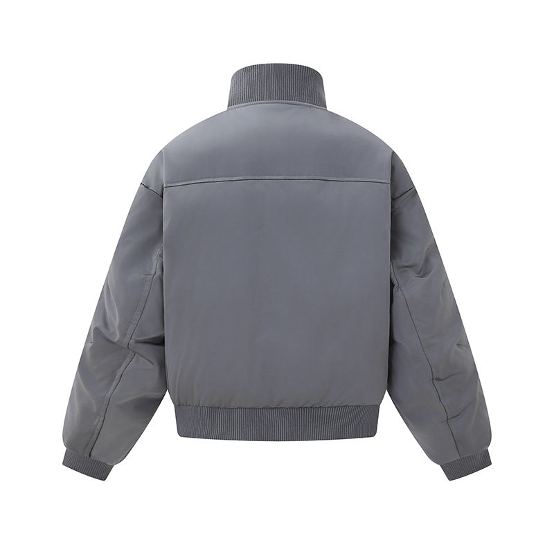 Women's short padded blouson jacket in boxy cut with high ribbed collar and prominent side pockets Mune Fashion