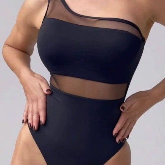 Women's one-piece swimsuit with asymmetrical cut and transparent accents Mune Fashion