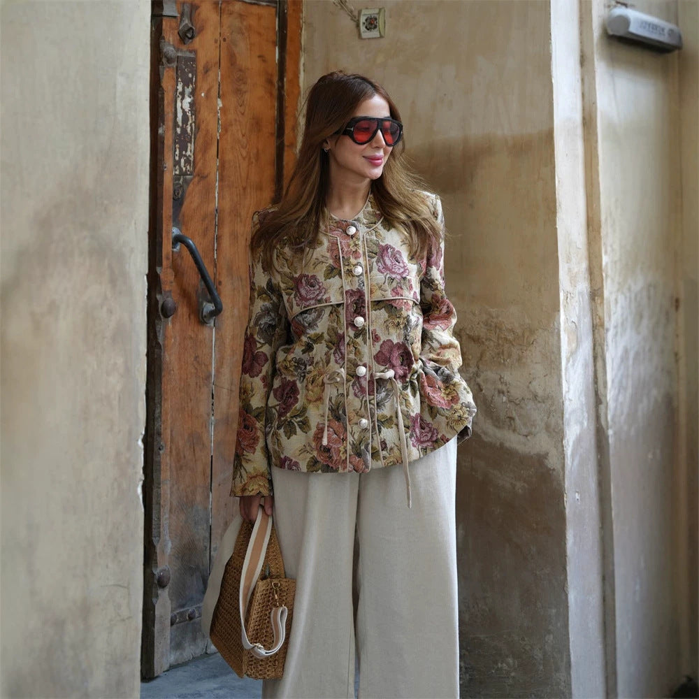 Ladies short jacquard blouson jacket with floral weave pattern, drawstring waist and pearlescent buttons Mune Fashion