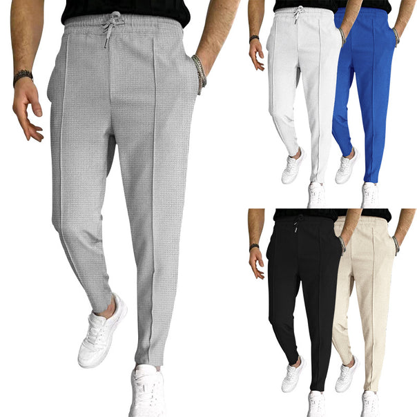 Men's tapered jogging chinos made of structured woven quality with elastic drawstring waistband and decorative crease Mune Fashion