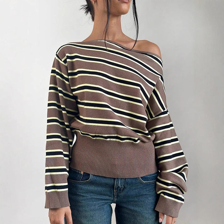 Women's fine knit boatneck pullover with asymmetrical shoulder drop, wide ribbed hem, and casual balloon sleeves Mune Fashion