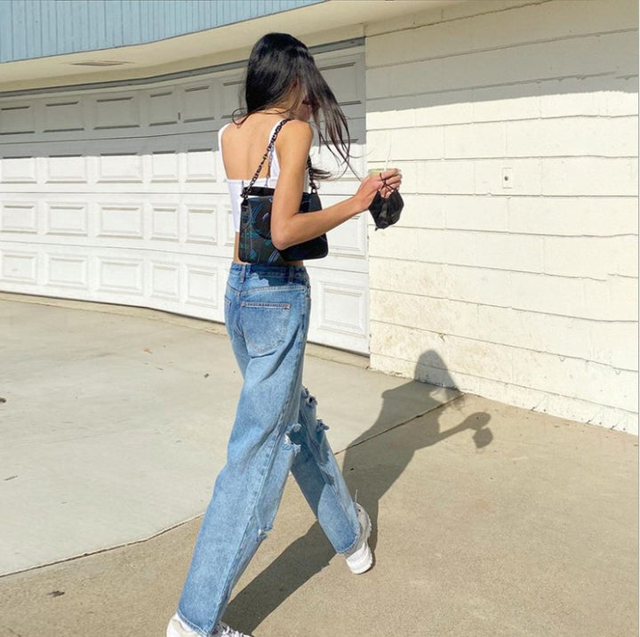 Women's high-cut wide jeans in baggy style with knee fraying and elastic hem Mune Fashion