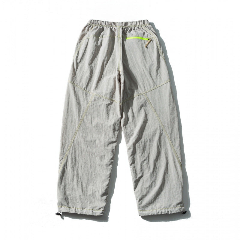Unisex Loose-fitting outdoor pants with elastic waistband, drawstring, and adjustable leg cuffs Mune Fashion