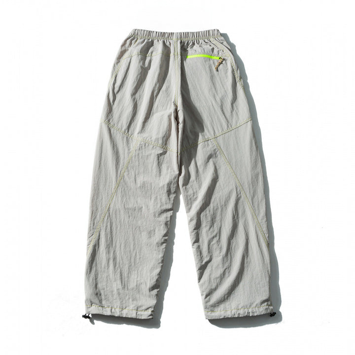 Unisex Loose-fitting outdoor pants with elastic waistband, drawstring, and adjustable leg cuffs Mune Fashion