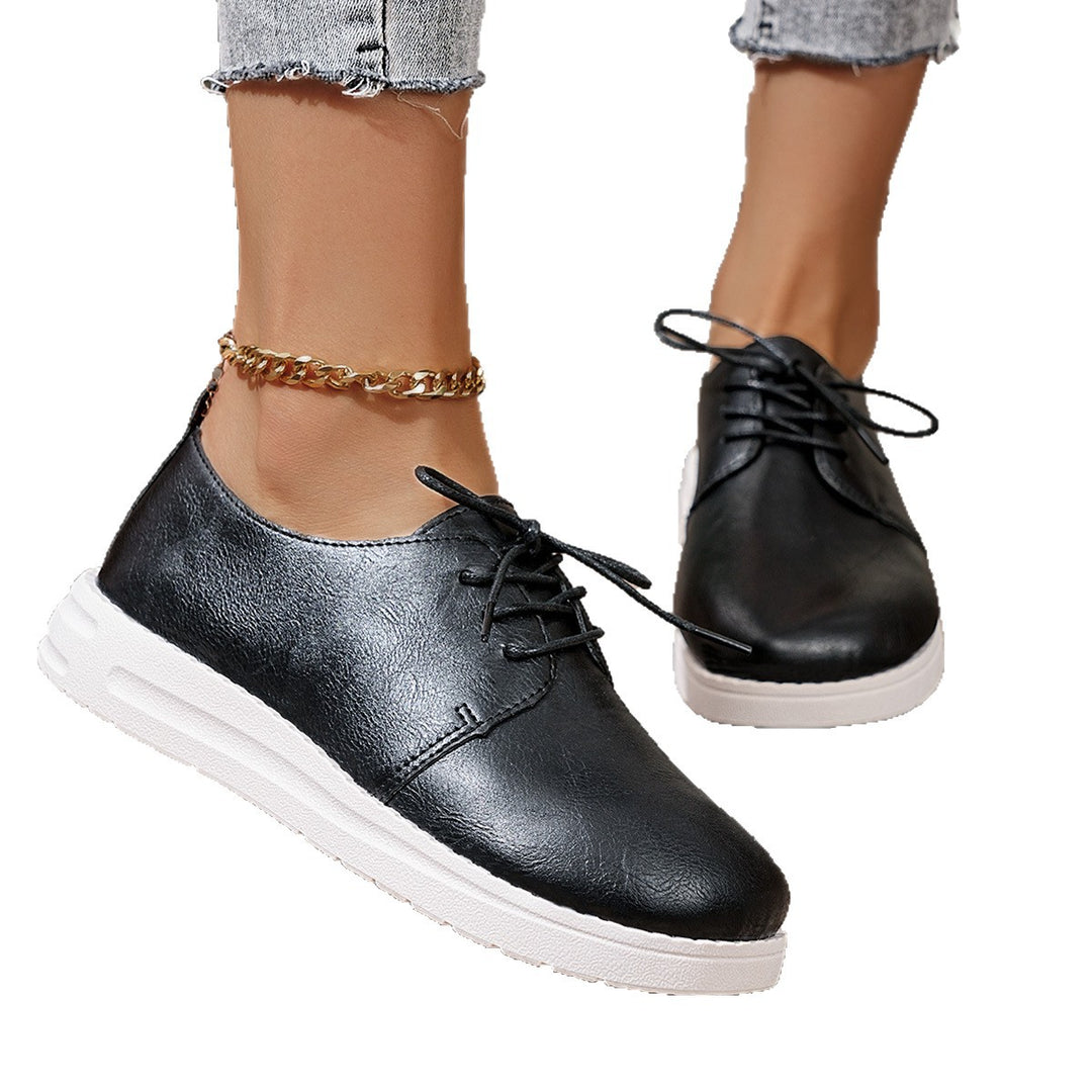 Women's lace-up sneakers made of synthetic leather with a cushioned comfort footbed and light profile sole Mune Fashion