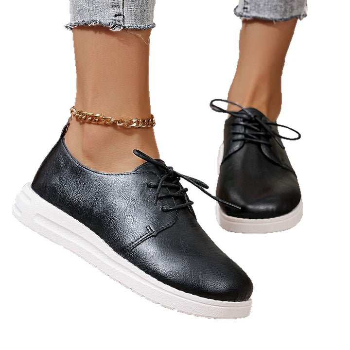 Women's lace-up sneakers made of synthetic leather with a cushioned comfort footbed and light profile sole Mune Fashion
