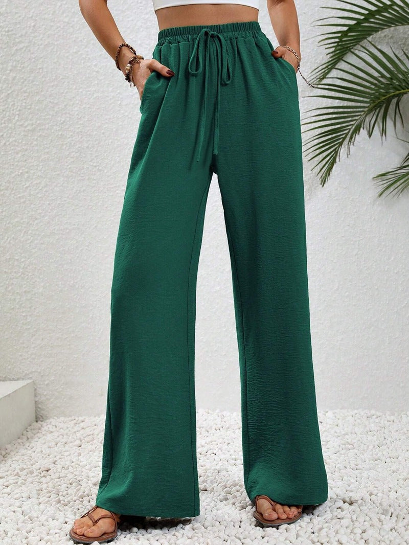 Ladies lightweight, loose-fitting beach pants with elastic waistband, drawstring and side pockets Mune Fashion