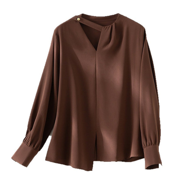 Women's elegant oversized blouse with asymmetrical V-neck and cuffed sleeves Mune Fashion