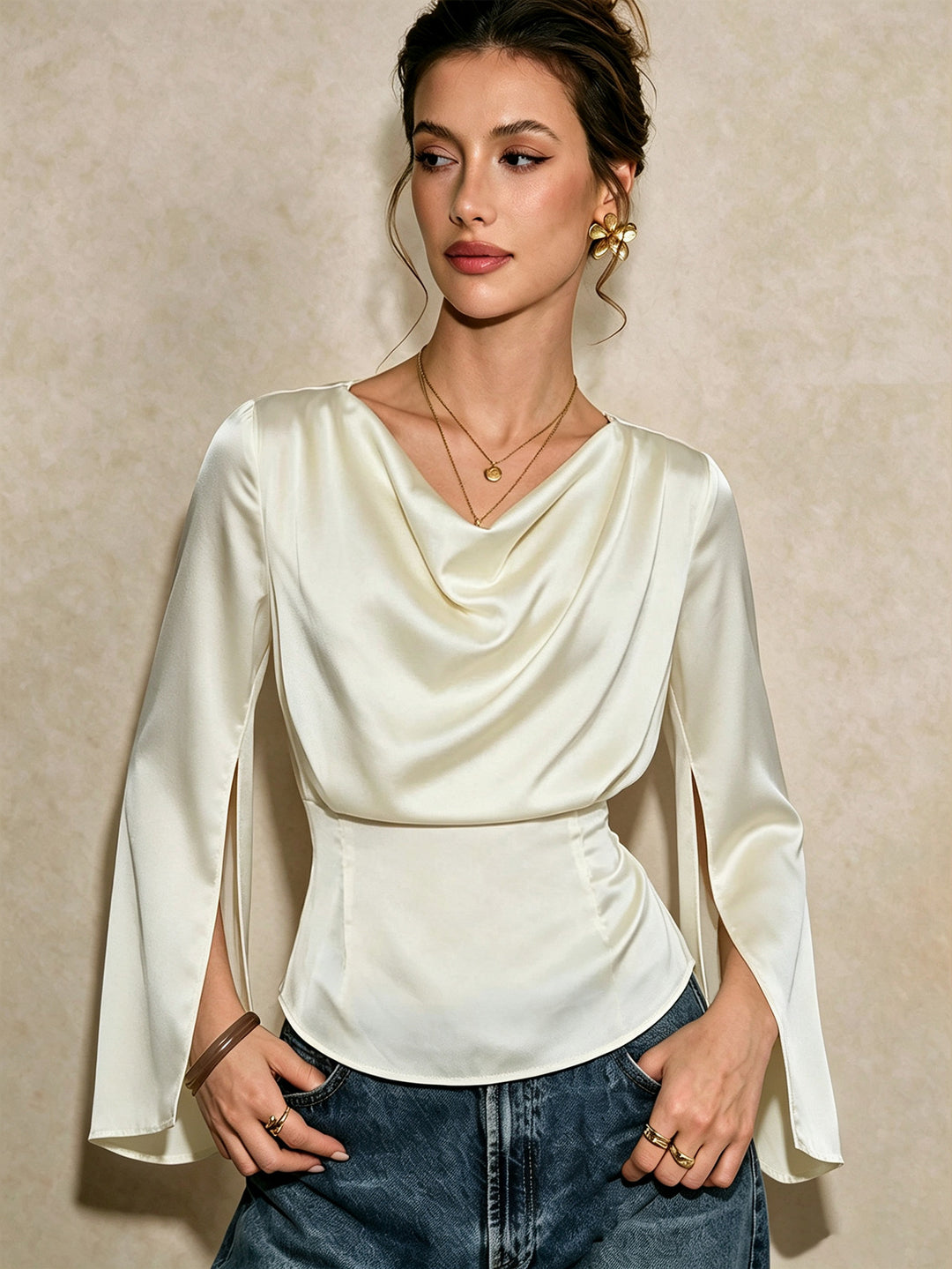 Women's elegant satin blouse with waterfall neckline, tailored silhouette and long sleeve slits.