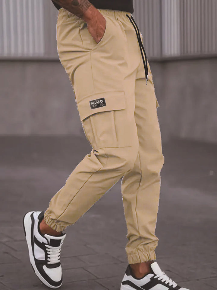 Men's cargo jogging pants with elastic waistband, cargo pockets & drawstring Mune Fashion