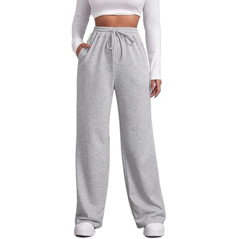 Women's flowing Relax palazzo pants with high comfort waistband, drawstring and side slip pockets Mune Fashion