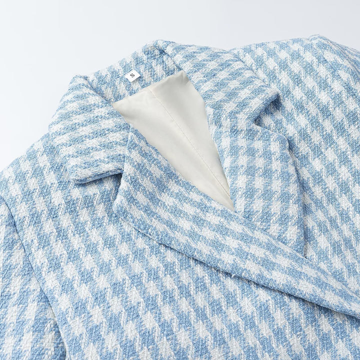 Ladies two-piece short blazer and pleated skirt ensemble in houndstooth style Mune Fashion