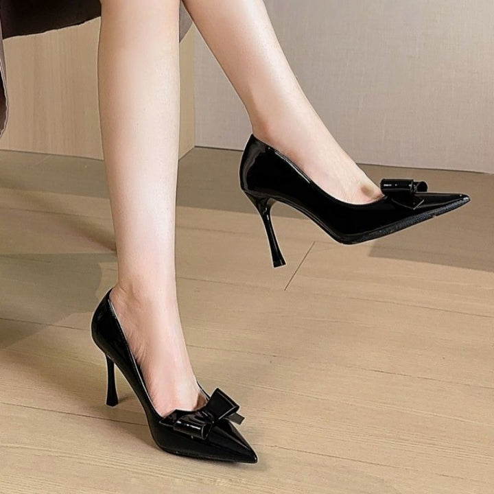 Women's pointed toe patent pumps with curved toe cap and decorative bow Mune Fashion
