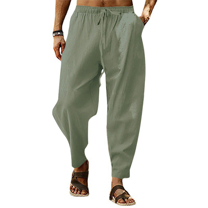 Men's relaxed summer slouch pants made of linen blend with elastic waistband and tapered ankle cuffs Mune Fashion