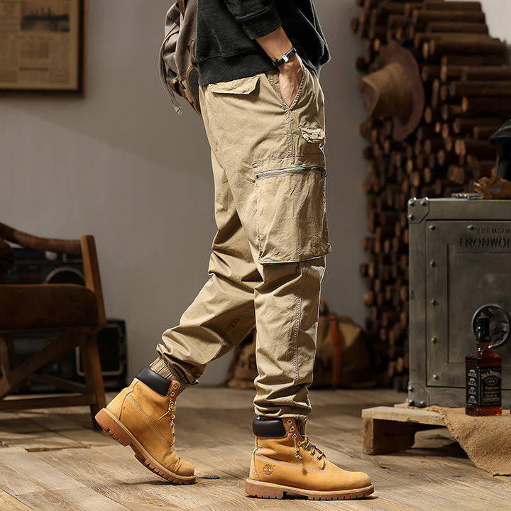Men's Utility Cargo Jogger made of durable cotton twill with elastic comfort waistband, multiple pockets, and zippered thigh pocket Drune