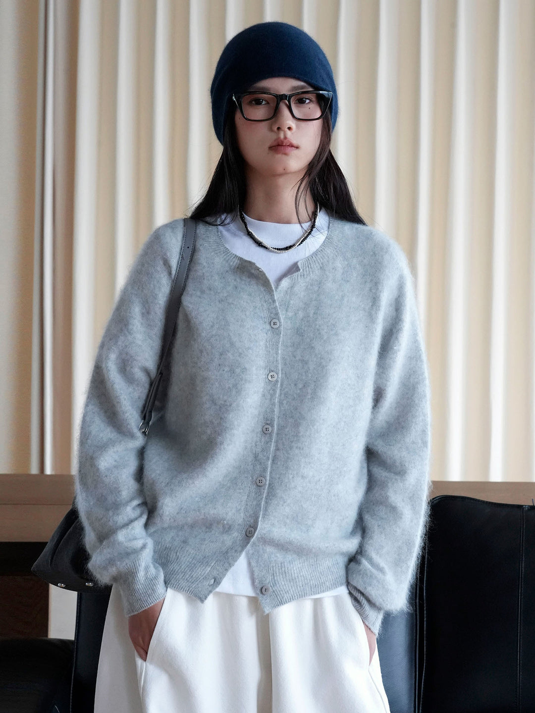 Women's short cardigan made of fluffy mohair mix with button placket and round neck