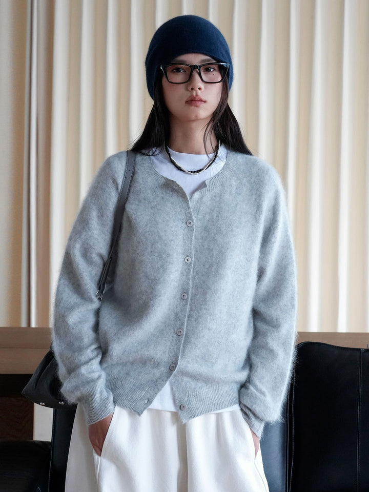 Women's short cardigan made of fluffy mohair mix with button placket and round neck