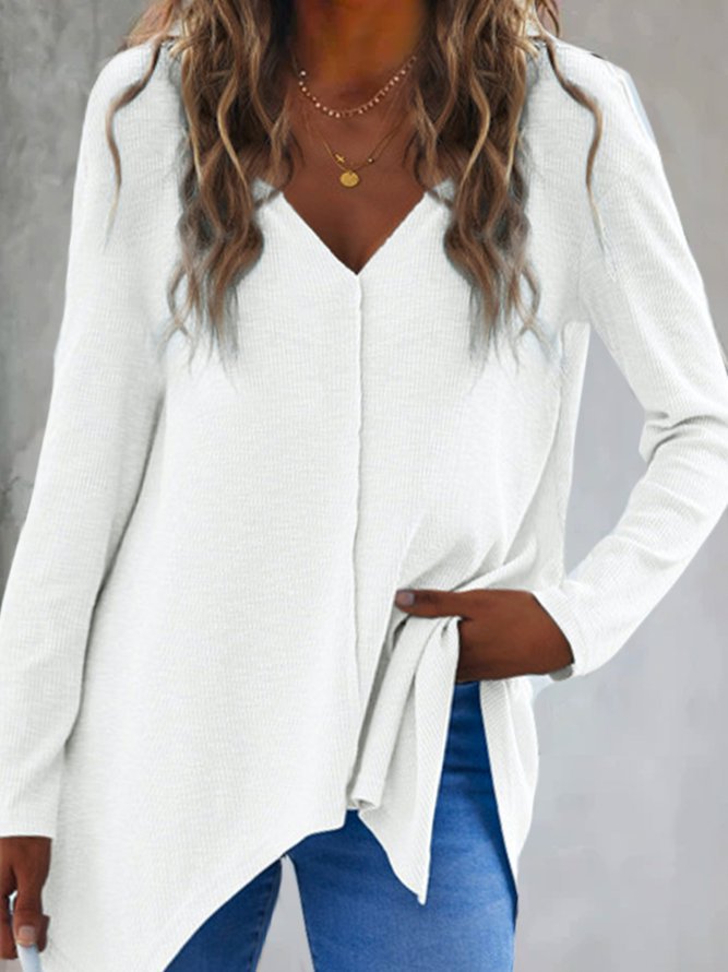 Ladies V neck fine knit tunic with asymmetrical hem and side slit Mune Fashion
