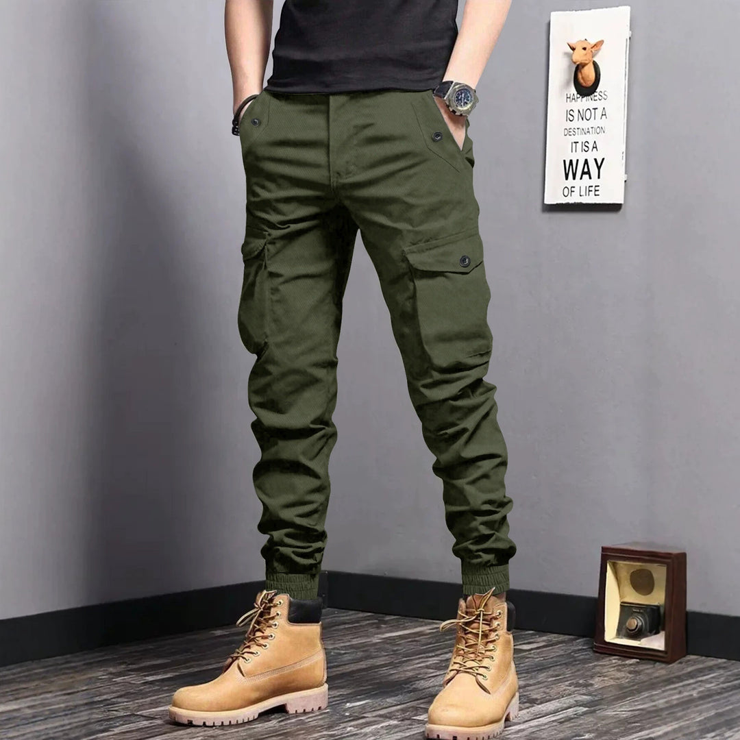 Men's cargo jogger pants with elastic waistband, drawstring, and multifunctional pockets.