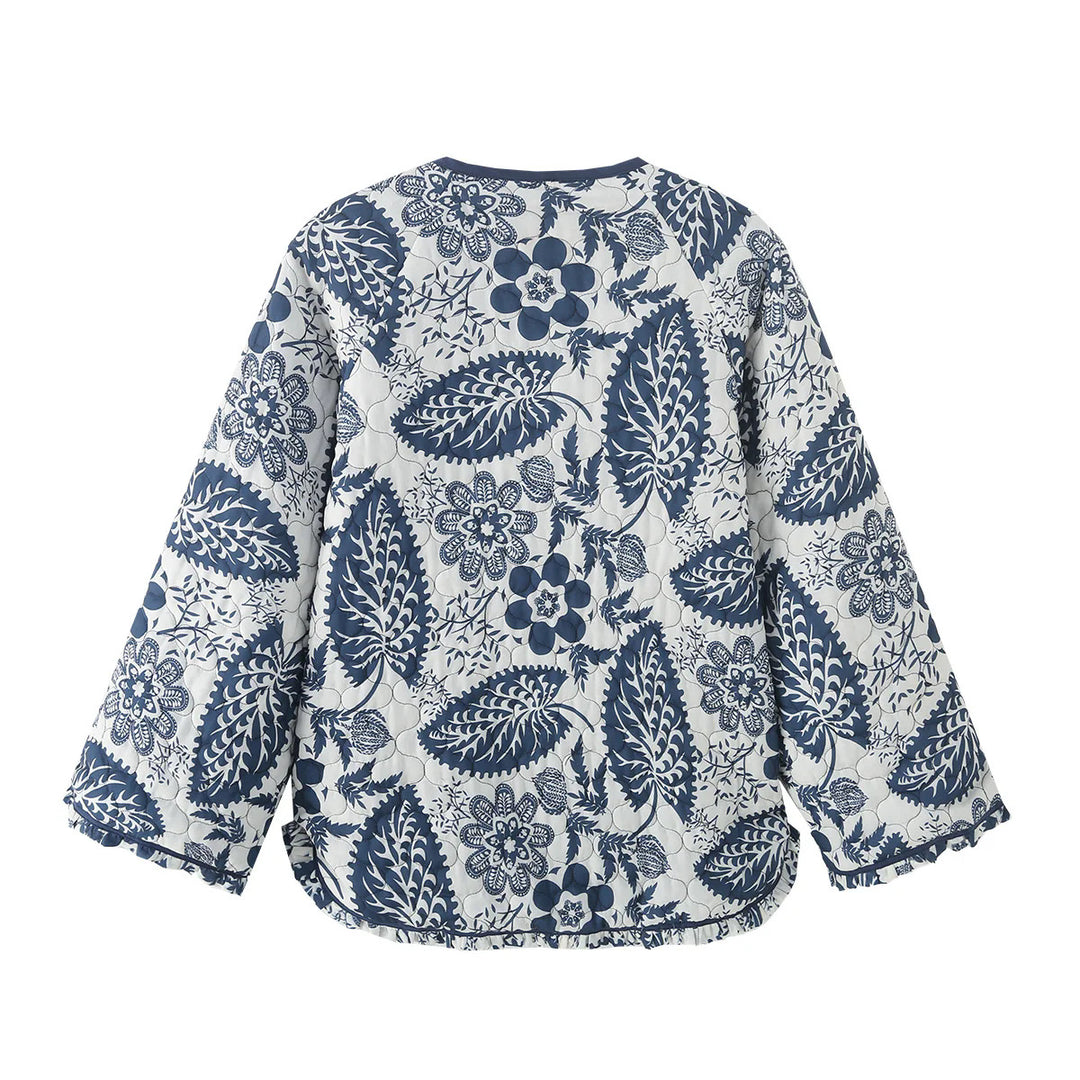 Women's nan quilted jacket with floral patchwork print, round button placket and rounded hem Mune Fashion