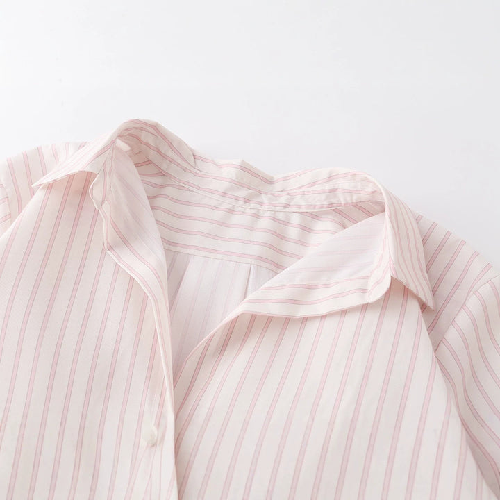 Women Loose Fit Shirt Blouse with Deep V-Neck and Extended Back Hem Drune