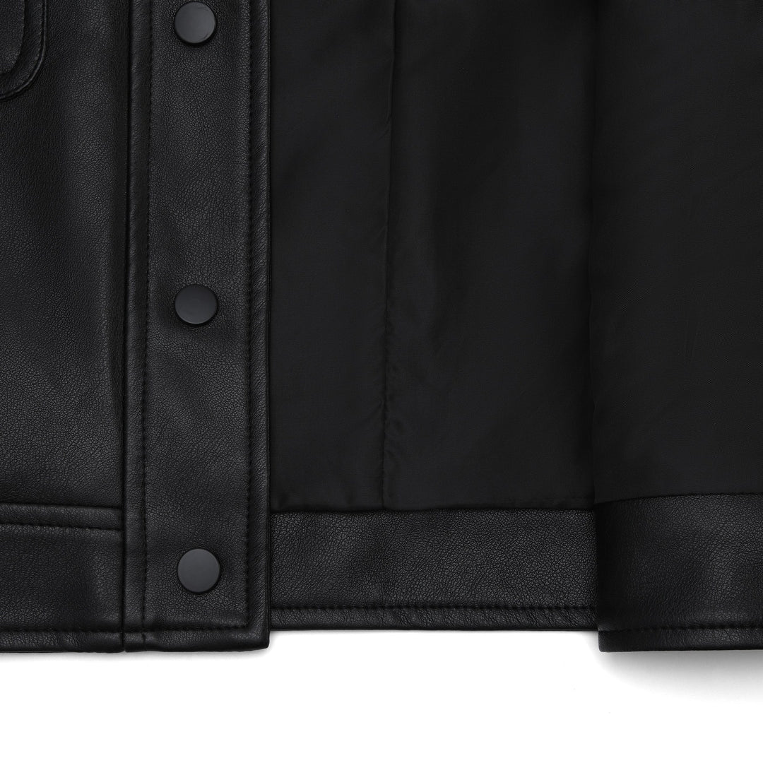 Women's short jacket made of faux leather with round neck, snap button closure and patch pockets Mune Fashion