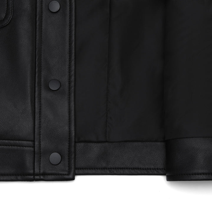 Women's short jacket made of faux leather with round neck, snap button closure and patch pockets Mune Fashion